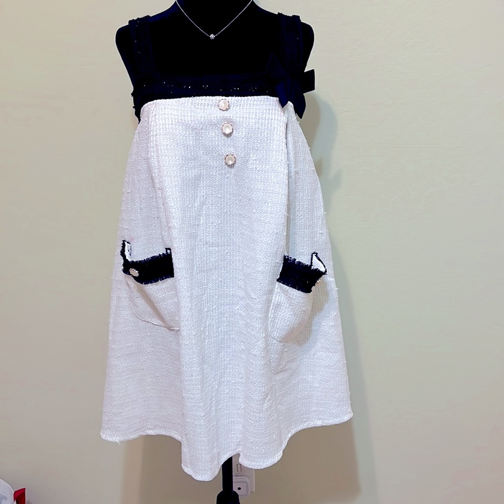 Baby Doll Dress front pockets with stud buttons